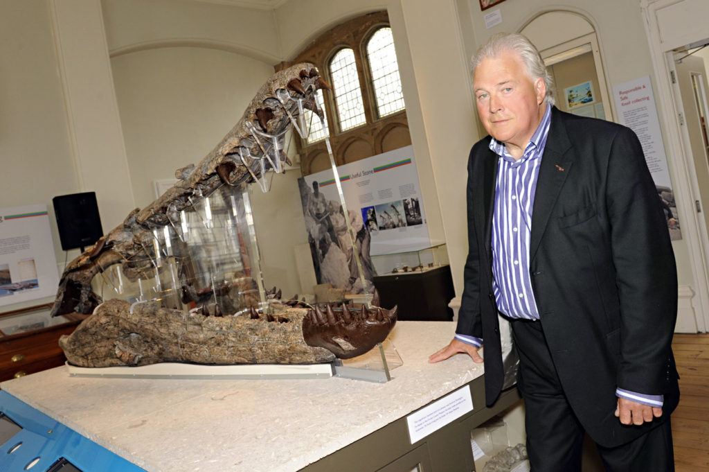 Pliosaur photographed with the fossil collector who discovered it, Kevan Sheehan.