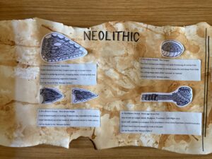 A small piece of the completed banner focusing on neolithic period