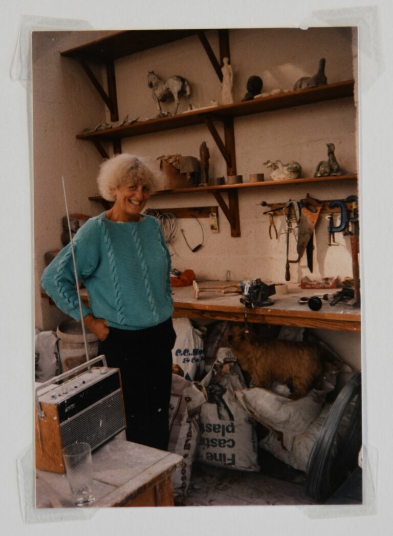 Artist © Tully and Bree Jammet/Frink Archive, courtesy of Dorset History Centre – Frink in Woolland House studio with her Norfolk Terrier, c. 1988