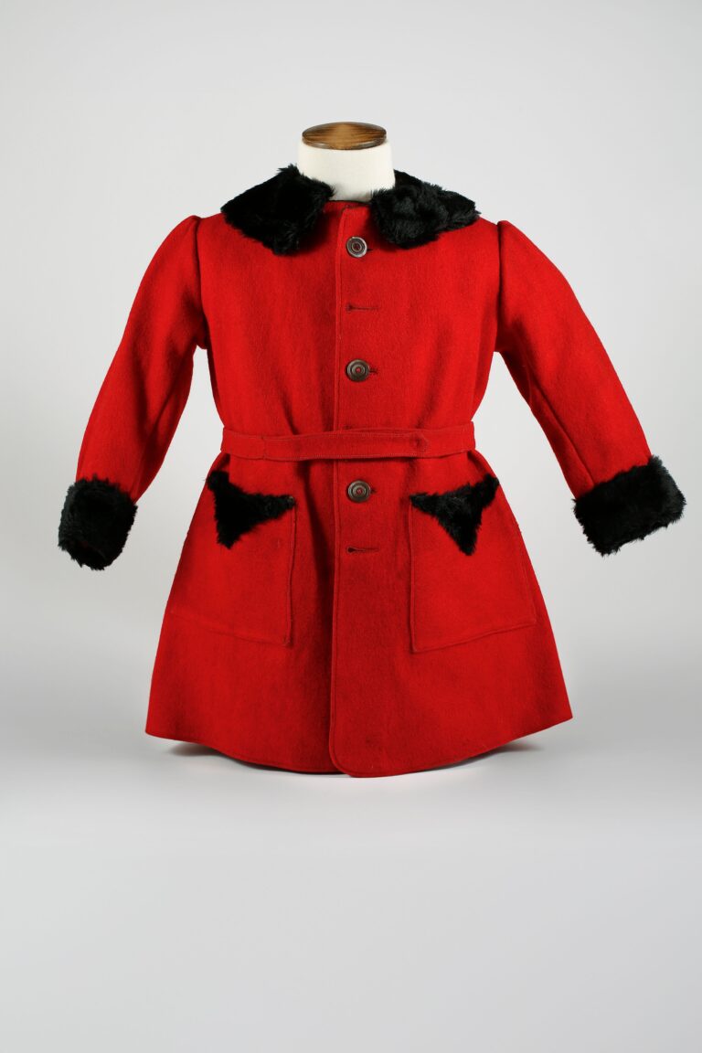 Child's red coat with black fur collar and cuffs and pocket trims, With kind permission of Salisbury Museum ©]